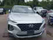 2019 Hyundai Santa Fe SE z VIN 5NMS23AD0KH011086, wystawiony jako IAAI lot #43300514 z przebiegiem 109 476 mil mil oraz . Historia ofert i sprzedaży dostępna na DreamBid. Obrazek 12.