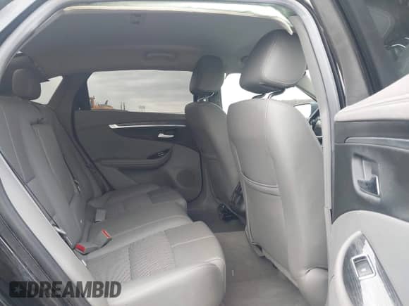 2018 Chevrolet Impala LT with VIN 1G1105SA7JU138922, listed as a IAAI auction lot 43323071 with 149,546 mi miles and . Bid and sale history available at DreamBid. Image 8.