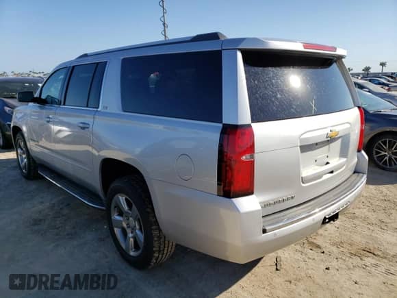 2016 Chevrolet Suburban LTZ z VIN 1GNSKJKC2GR433297, wystawiony jako Copart lot #65443682 z przebiegiem Nie podano mil oraz . Historia ofert i sprzedaży dostępna na DreamBid. Obrazek 3.