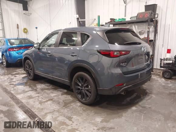 2022 Mazda CX-5 S Preferred z VIN JM3KFBCM0N1585446, wystawiony jako IAAI lot #42393723 z przebiegiem 70 131 mil mil oraz . Historia ofert i sprzedaży dostępna na DreamBid. Obrazek 3.