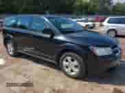 2013 Dodge Journey American Value z VIN 3C4PDCAB1DT665342, wystawiony jako IAAI lot #43204169 z przebiegiem 165 036 mil mil oraz . Historia ofert i sprzedaży dostępna na DreamBid. Obrazek 1.