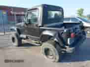 2001 Jeep Wrangler Sport z VIN 1J4FA49S51P352240, wystawiony jako IAAI lot #43492638 z przebiegiem Nie podano mil oraz . Historia ofert i sprzedaży dostępna na DreamBid. Obrazek 3.