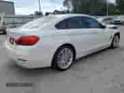 2015 BMW 4 Series 428i z VIN WBA4A5C55FD410391, wystawiony jako Copart lot #71389865 z przebiegiem 136 706 mil mil oraz Szkoda całkowita • Salvage title. Historia ofert i sprzedaży dostępna na DreamBid. Obrazek 3.