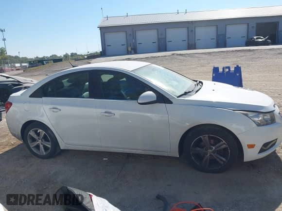 2014 Chevrolet Cruze 2LT with VIN 1G1PE5SB6E7329532, listed as a IAAI auction lot 43120171 with 223,043 mi miles and . Bid and sale history available at DreamBid. Image 13.