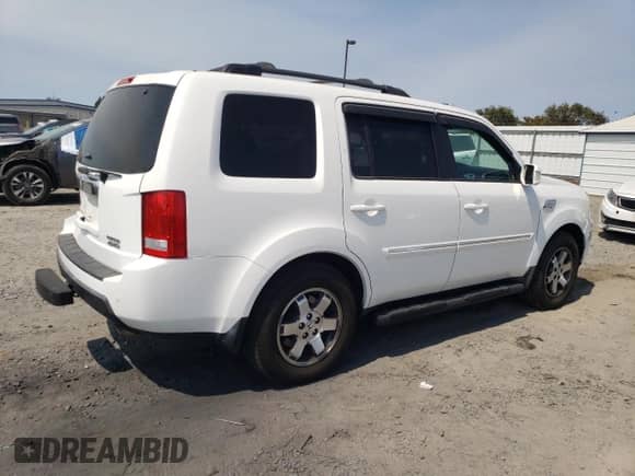 2010 Honda Pilot Touring with VIN 5FNYF4H86AB001871, listed as a Copart auction lot 70506155 with 133,582 mi miles and Salvage title. Bid and sale history available at DreamBid. Image 3.