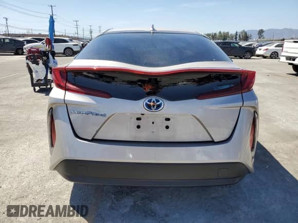 2018 Toyota Prius Plus z VIN JTDKARFP7J3099284, wystawiony jako Copart lot #58186915 z przebiegiem 51 694 mil mil oraz Szkoda całkowita • Salvage title. Historia ofert i sprzedaży dostępna na DreamBid. Obrazek 6.