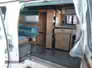 1991 Ford Econoline Cargo с VIN 1FDHS34G0MHA09337, выставлен на аукционе IAAI как лот 41346321 с пробегом 477 492 миль миль и . История ставок и продаж доступна на DreamBid. Изображение 8.