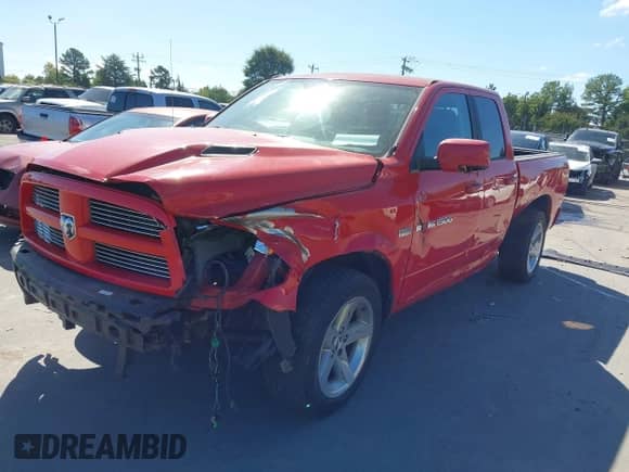 2011 Ram 1500 Big Horn with VIN 1D7RB1GT4BS614859, listed as a IAAI auction lot 43363382 with 102,006 mi miles and . Bid and sale history available at DreamBid. Image 2.