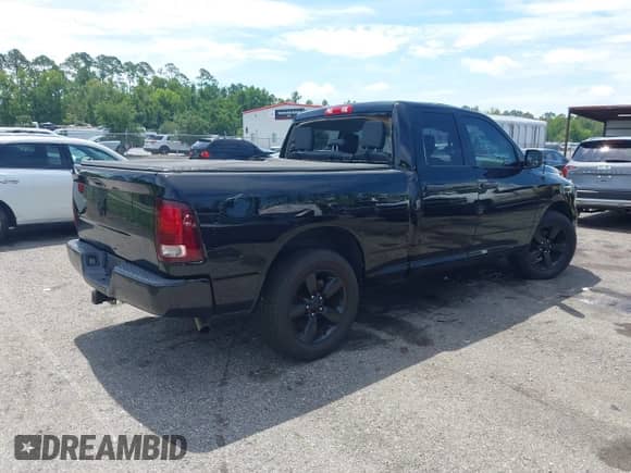 2015 Ram 1500 Tradesman with VIN 1C6RR6FG0FS591956, listed as a IAAI auction lot 42706055 with 134,273 mi miles and . Bid and sale history available at DreamBid. Image 4.