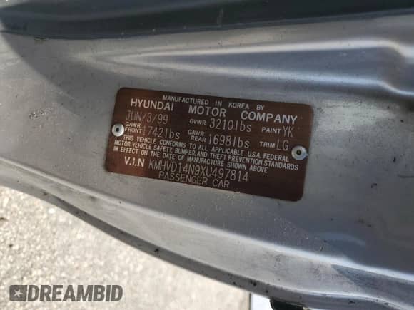 1999 Hyundai Accent L z VIN KMHVD14N9XU497814, wystawiony jako Copart lot #60374665 z przebiegiem 287 585 mil mil oraz Szkoda całkowita • Salvage title. Historia ofert i sprzedaży dostępna na DreamBid. Obrazek 13.