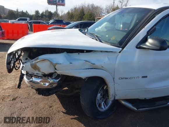 2000 Dodge Dakota Sport z VIN 1B7GL2AN5YS695474, wystawiony jako IAAI lot #38624575 z przebiegiem 94 328 mil mil oraz . Historia ofert i sprzedaży dostępna na DreamBid. Obrazek 6.