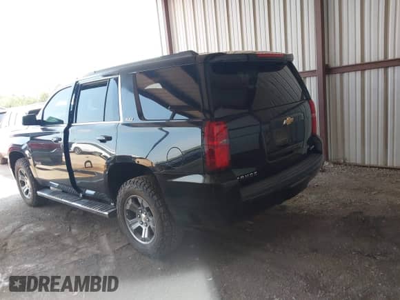2015 Chevrolet Tahoe LT z VIN 1GNSKBKC2FR593328, wystawiony jako IAAI lot #42919786 z przebiegiem 157 484 mil mil oraz . Historia ofert i sprzedaży dostępna na DreamBid. Obrazek 4.