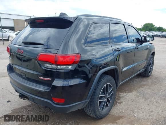 2019 Jeep Grand Cherokee Trailhawk z VIN 1C4RJFLGXKC608724, wystawiony jako IAAI lot #42602108 z przebiegiem 112 713 mil mil oraz . Historia ofert i sprzedaży dostępna na DreamBid. Obrazek 4.