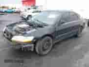 1999 Honda Accord EX with VIN 1HGCG1653XA047790, listed as a IAAI auction lot 40801906 with 266,561 mi miles and . Bid and sale history available at DreamBid. Image 2.