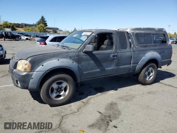 2001 Nissan Frontier SE Desert Runner with VIN 1N6ED26T31C312110, listed as a Copart auction lot 80904815 with 281,926 mi miles and Salvage title. Bid and sale history available at DreamBid. Image 1.