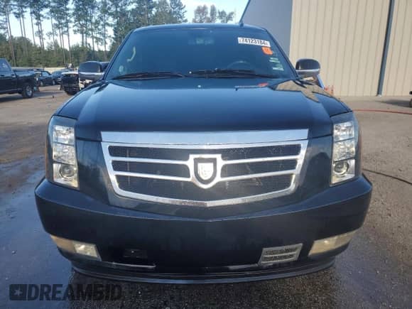 2009 Cadillac Escalade z VIN 1GYFC23219R293159, wystawiony jako Copart lot #74123184 z przebiegiem Nie podano mil oraz Szkoda całkowita • Salvage title. Historia ofert i sprzedaży dostępna na DreamBid. Obrazek 5.
