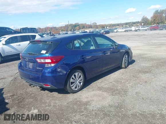 2017 Subaru Impreza with VIN 4S3GTAA66H3751578, listed as a IAAI auction lot 43496817 with 126,660 mi miles and . Bid and sale history available at DreamBid. Image 4.