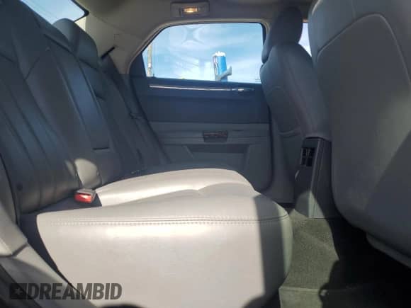 2005 Chrysler 300 C with VIN 2C3AA63H35H104303, listed as a Copart auction lot 82310295 with 128,937 mi miles and Salvage title. Bid and sale history available at DreamBid. Image 10.