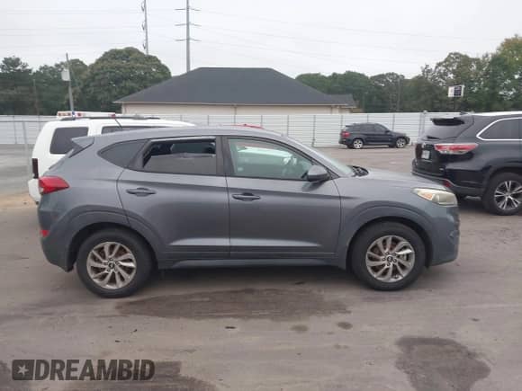 2016 Hyundai Tucson SE with VIN KM8J23A45GU221402, listed as a IAAI auction lot 43378531 with 151,478 mi miles and . Bid and sale history available at DreamBid. Image 13.