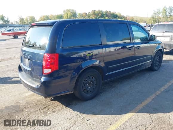 2015 Dodge Grand Caravan SE Plus with VIN 2C4RDGBG3FR671031, listed as a IAAI auction lot 43438557 with 246,415 mi miles and . Bid and sale history available at DreamBid. Image 4.