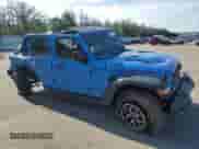 2024 Jeep Wrangler Rubicon with VIN 1C4PJXFG3RW369521, listed as a Copart auction lot 65037115 with 2,499 mi miles and Salvage title. Bid and sale history available at DreamBid. Image 4.