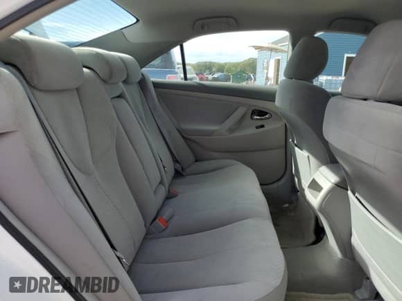 2009 Toyota Camry LE z VIN 4T1BE46KX9U806116, wystawiony jako Copart lot #85261255 z przebiegiem 196 982 mil mil oraz Czysty tytuł • Clean title. Historia ofert i sprzedaży dostępna na DreamBid. Obrazek 10.