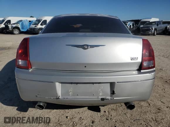 2005 Chrysler 300 Touring с VIN 2C3JA53G45H131463, выставлен на аукционе Copart как лот 44617125 с пробегом 70 318 миль миль и Списание • Salvage title. История ставок и продаж доступна на DreamBid. Изображение 6.