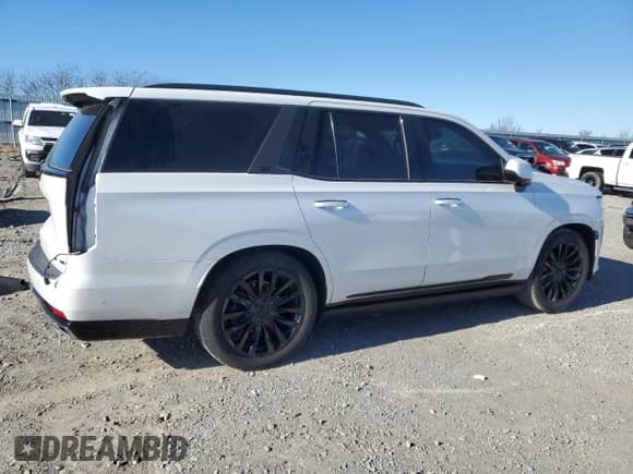 2022 Cadillac Escalade Premium Luxury с VIN 1GYS4CKL9NR154953, выставлен на аукционе Copart как лот 83537254 с пробегом 77 397 миль миль и Списание • Salvage title. История ставок и продаж доступна на DreamBid. Изображение 3.