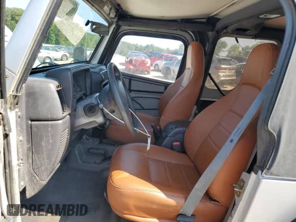 2002 Jeep Wrangler X with VIN 1J4FA39S02P750998, listed as a Copart auction lot 66619075 with 98,985 mi miles and Clean title. Bid and sale history available at DreamBid. Image 7.
