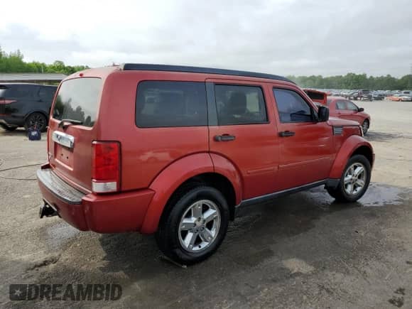 2008 Dodge Nitro SLT with VIN 1D8GT58K88W121992, listed as a Copart auction lot 54328795 with 189,663 mi miles and Salvage title. Bid and sale history available at DreamBid. Image 3.