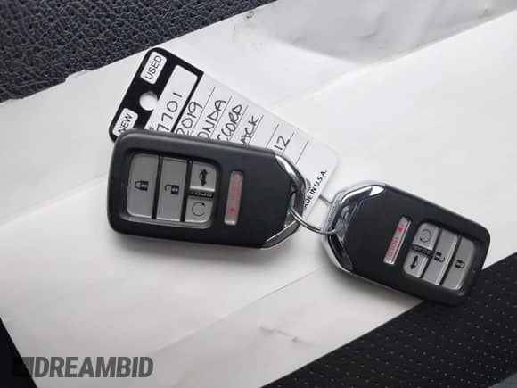 2019 Honda Accord Sport z VIN 1HGCV2F32KA004612, wystawiony jako IAAI lot #42400331 z przebiegiem 33 942 mil mil oraz . Historia ofert i sprzedaży dostępna na DreamBid. Obrazek 11.