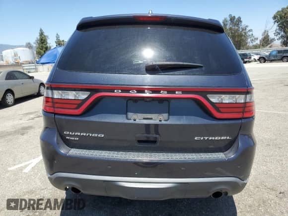 2014 Dodge Durango Citadel z VIN 1C4SDJET1EC594240, wystawiony jako Copart lot #58090285 z przebiegiem 160 027 mil mil oraz Szkoda całkowita • Salvage title. Historia ofert i sprzedaży dostępna na DreamBid. Obrazek 6.