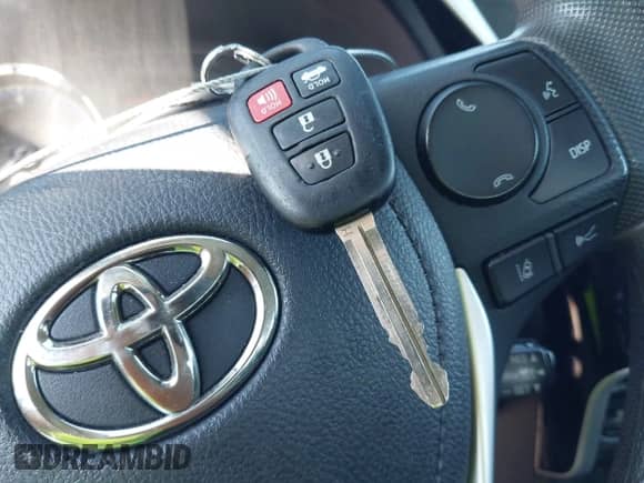 2019 Toyota Corolla LE with VIN 5YFBURHE9KP905654, listed as a IAAI auction lot 43098046 with 59,277 mi miles and . Bid and sale history available at DreamBid. Image 11.