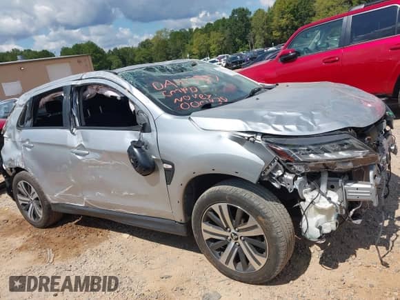 2021 Mitsubishi Outlander ES z VIN JA4APUAU4MU000438, wystawiony jako IAAI lot #43217915 z przebiegiem 63 685 mil mil oraz . Historia ofert i sprzedaży dostępna na DreamBid. Obrazek 13.