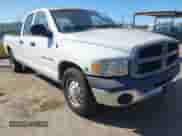 2004 Dodge 2500 SLT with VIN 3D7KA28604G133004, listed as a IAAI auction lot 41654514 with 57,453 mi miles and . Bid and sale history available at DreamBid. Image 1.