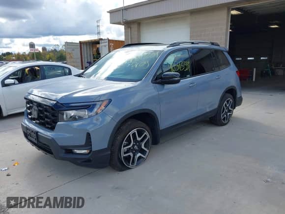 2023 Honda Passport Elite z VIN 5FNYF8H03PB000039, wystawiony jako IAAI lot #40593339 z przebiegiem 33 697 mil mil oraz . Historia ofert i sprzedaży dostępna na DreamBid. Obrazek 2.