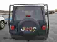 2005 Jeep Wrangler SE z VIN 1J4FA29155P363501, wystawiony jako Copart lot #80388314 z przebiegiem 97 564 mil mil oraz Czysty tytuł • Clean title. Historia ofert i sprzedaży dostępna na DreamBid. Obrazek 6.