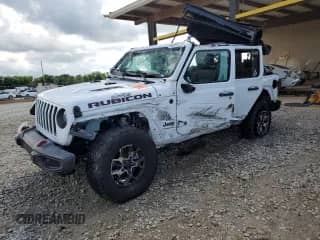 2023 Jeep Wrangler Rubicon with VIN 1C4HJXFN8PW619755, listed as a Copart auction lot 62449735 with 23,910 mi miles and Salvage title. Bid and sale history available at DreamBid. Image 1.