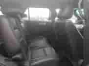 2011 Ford Explorer Limited z VIN 1FMHK8F88BGA91727, wystawiony jako Copart lot #82213435 z przebiegiem 138 026 mil mil oraz Czysty tytuł • Clean title. Historia ofert i sprzedaży dostępna na DreamBid. Obrazek 11.