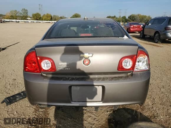2012 Chevrolet Malibu 1LS z VIN 1G1ZB5E06CF322160, wystawiony jako Copart lot #84866225 z przebiegiem 84 438 mil mil oraz Szkoda całkowita • Salvage title. Historia ofert i sprzedaży dostępna na DreamBid. Obrazek 6.