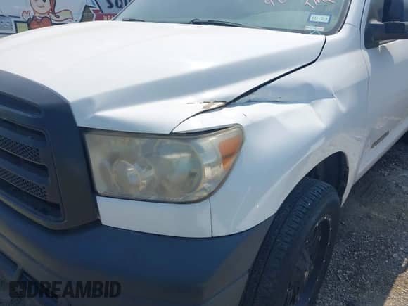 2012 Toyota Tundra z VIN 5TFRU5F18CX026656, wystawiony jako IAAI lot #42949363 z przebiegiem 294 338 mil mil oraz . Historia ofert i sprzedaży dostępna na DreamBid. Obrazek 6.