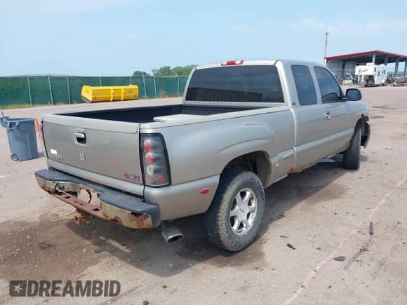 2002 GMC Sierra 1500 Denali z VIN 2GTFK69U621313333, wystawiony jako IAAI lot #42865188 z przebiegiem 200 820 mil mil oraz . Historia ofert i sprzedaży dostępna na DreamBid. Obrazek 4.
