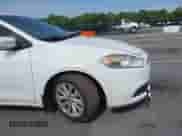 2014 Dodge Dart Aero with VIN 1C3CDFDH4ED683233, listed as a IAAI auction lot 42289776 with 154,898 mi miles and . Bid and sale history available at DreamBid. Image 12.