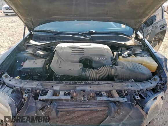 2015 Chrysler 300 S с VIN 2C3CCABG8FH763171, выставлен на аукционе Copart как лот 71387225 с пробегом 104 491 миль миль и Списание • Salvage title. История ставок и продаж доступна на DreamBid. Изображение 11.