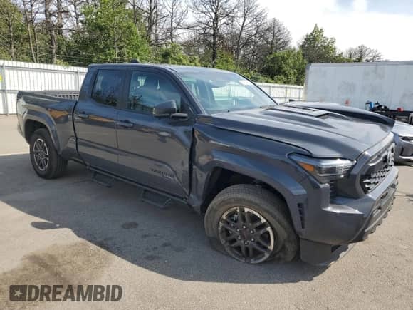 2025 Toyota Tacoma SR with VIN 3TMLB5JN9SM137792, listed as a Copart auction lot 80064475 with 6,038 mi miles and Salvage title. Bid and sale history available at DreamBid. Image 4.