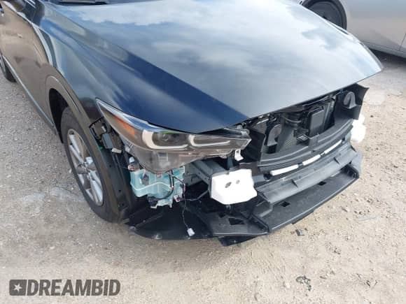 2025 Mazda CX-5 S Preferred z VIN JM3KFBCL5S0695658, wystawiony jako IAAI lot #43301142 z przebiegiem Nie podano mil oraz . Historia ofert i sprzedaży dostępna na DreamBid. Obrazek 17.