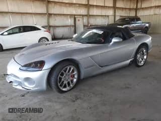 2005 Dodge Viper SRT-10 with VIN 1B3JZ65Z35V501142, listed as a Copart auction lot 77579284 with 20,074 mi miles and Salvage title. Bid and sale history available at DreamBid. Image 1.