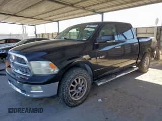 2009 Dodge 1500 SLT z VIN 1D3HB13T49S718734, wystawiony jako Copart lot #58014015 z przebiegiem 124 165 mil mil oraz Szkoda całkowita • Salvage title. Historia ofert i sprzedaży dostępna na DreamBid. Obrazek 1.