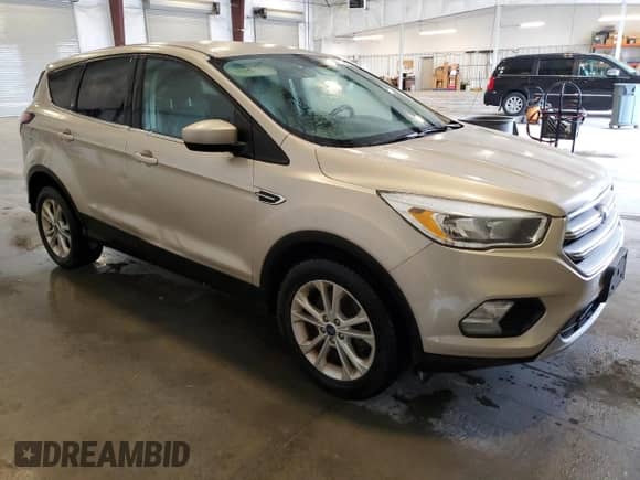 2017 Ford Escape SE с VIN 1FMCU9GD7HUE73439, выставлен на аукционе Copart как лот 81033735 с пробегом 179 814 миль миль и Чистый • Clean title. История ставок и продаж доступна на DreamBid. Изображение 4.