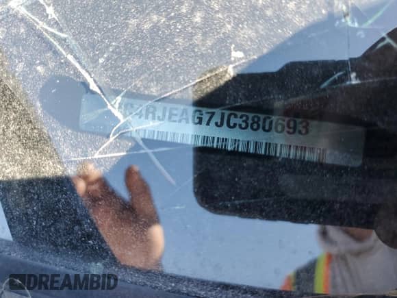 2018 Jeep Grand Cherokee Laredo E с VIN 1C4RJEAG7JC380693, выставлен на аукционе Copart как лот 56560305 с пробегом Не указан миль и Списание • Salvage title. История ставок и продаж доступна на DreamBid. Изображение 13.